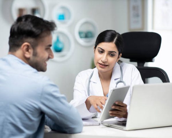 A doctor reviewing a care plan with a patient